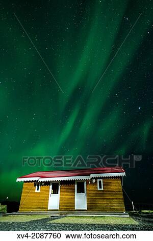 Northern lights above small village of Bleidabollstadur, Vatnajokull National Park, Iceland. View Large Photo Image Stock Image - Northern lights above small village of Bleidabollstadur, Vatnajokull National Park, Iceland.. Fotosearch