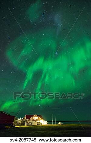 Northern lights above small village of Bleidabollstadur, Vatnajokull National Park, Iceland. View Large Photo Image Stock Photography - Northern lights above small village of Bleidabollstadur, Vatnajokull National Park, Iceland.. Fotosearch