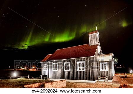 Picture - Northern lights in Reyjanesta harbour, Iceland.. Fotosearch