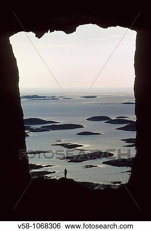Norway, Nordland, Bronnoysund region, The hole of Torghatten rock and the Coastal Steamer View Large Photo Image Stock Photograph - Norway, Nordland, Bronnoysund region, The hole of Torghatten rock and the Coastal Steamer. Fotosearch