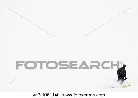 Norway, Oslo, Holmenkollen A skier enjoys a winter snowfall on the slopes of the Tryvann Skifield, in the Holmenkollen area View Large Photo Image Stock Image - Norway, Oslo, Holmenkollen A skier enjoys a winter snowfall on the slopes of the Tryvann Skifield, in the Holmenkollen area. Fotosearch