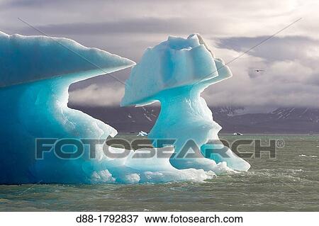 Norway, Svalbard, Spitsbergen, Lilliehook Glacier in Krossfjorden, Iceberg View Large Photo Image Stock Photo - Norway, Svalbard, Spitsbergen, Lilliehook Glacier in Krossfjorden, Iceberg. Fotosearch