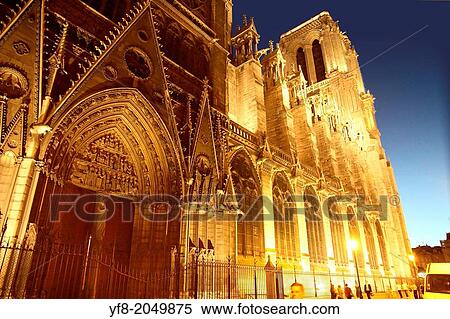 Stock Photography - Notre Dame cathedral at dusk Paris France.. Fotosearch