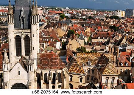 Notre Dame church was built in the 13th century, 17th century H? tel de Vog?? on the right, Dijon, C? te d? Or, Burgundy, France View Large Photo Image Picture - Notre Dame church was built in the 13th century, 17th century H? tel de Vog?? on the right, Dijon, C? te d? Or, Burgundy, France. Fotosearch
