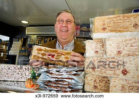 Nougat candy salesman Alicante Spain View Large Photo Image Stock Photo - Nougat candy salesman Alicante Spain. Fotosearch