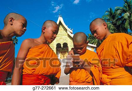Novice monks at temple. Luang Prabang, Laos View Large Photo Image Stock Image - Novice monks at temple. Luang Prabang, Laos. Fotosearch