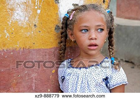 Stock Photo - Nubian girl inside Elephantine Island, in Aswan. Fotosearch