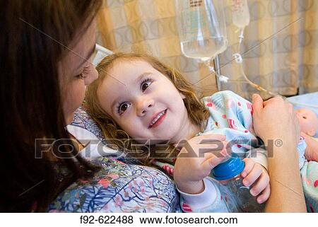 Stock Photo - Nurse and child. Fotosearch