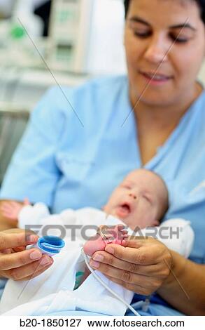 Nurse care, Neonate Intensive care Unit, Donostia Hospital, San Sebastian, Donostia, Gipuzkoa, Basque Country, Spain View Large Photo Image Stock Photo - Nurse care, Neonate Intensive care Unit, Donostia Hospital, San Sebastian, Donostia, Gipuzkoa, Basque Country, Spain. Fotosearch