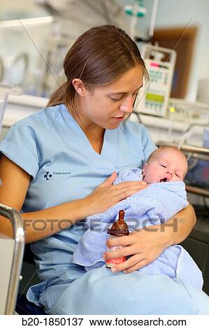 Nurse care, Neonate Intensive care Unit, Donostia Hospital, San Sebastian, Donostia, Gipuzkoa, Basque Country, Spain View Large Photo Image Stock Photo - Nurse care, Neonate Intensive care Unit, Donostia Hospital, San Sebastian, Donostia, Gipuzkoa, Basque Country, Spain. Fotosearch