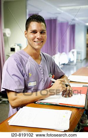 Nurse in emergency area. Hospital Universitario de Gran Canaria Doctor Negrin, Las Palmas de Gran Canaria. Canary Islands, Spain View Large Photo Image Stock Image - Nurse in emergency area. Hospital Universitario de Gran Canaria Doctor Negrin, Las Palmas de Gran Canaria. Canary Islands, Spain. Fotosearch