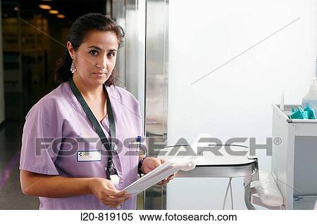 Nurse in emergency area. Hospital Universitario de Gran Canaria Doctor Negrin, Las Palmas de Gran Canaria. Canary Islands, Spain View Large Photo Image Stock Photography - Nurse in emergency area. Hospital Universitario de Gran Canaria Doctor Negrin, Las Palmas de Gran Canaria. Canary Islands, Spain. Fotosearch