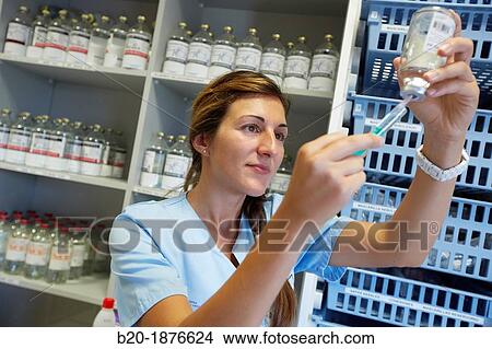 nurse preparing medication, nursing control, plant hospitalization, Hospital Donostia, San Sebastian, Gipuzkoa, Basque Country, Spain View Large Photo Image Picture - nurse preparing medication, nursing control, plant hospitalization, Hospital Donostia, San Sebastian, Gipuzkoa, Basque Country, Spain. Fotosearch