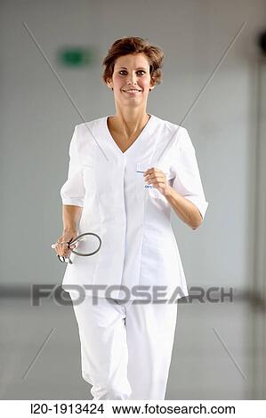 Nurse walking in corridor, Onkologikoa Hospital, Oncology Institute, Case Center for prevention, diagnosis and treatment of cancer, Donostia, San Sebastian, Gipuzkoa, Basque Country, Spain View Large Photo Image Picture - Nurse walking in corridor, Onkologikoa Hospital, Oncology Institute, Case Center for prevention, diagnosis and treatment of cancer, Donostia, San Sebastian, Gipuzkoa, Basque Country, Spain. Fotosearch