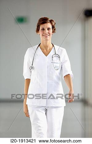 Nurse walking in corridor, Onkologikoa Hospital, Oncology Institute, Case Center for prevention, diagnosis and treatment of cancer, Donostia, San Sebastian, Gipuzkoa, Basque Country, Spain View Large Photo Image Stock Image - Nurse walking in corridor, Onkologikoa Hospital, Oncology Institute, Case Center for prevention, diagnosis and treatment of cancer, Donostia, San Sebastian, Gipuzkoa, Basque Country, Spain. Fotosearch