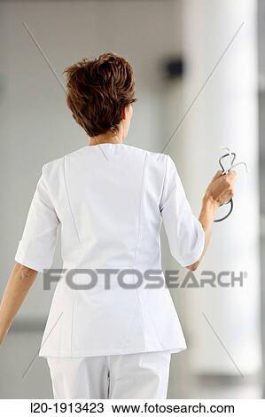 Nurse walking in corridor, Onkologikoa Hospital, Oncology Institute, Case Center for prevention, diagnosis and treatment of cancer, Donostia, San Sebastian, Gipuzkoa, Basque Country, Spain View Large Photo Image Stock Image - Nurse walking in corridor, Onkologikoa Hospital, Oncology Institute, Case Center for prevention, diagnosis and treatment of cancer, Donostia, San Sebastian, Gipuzkoa, Basque Country, Spain. Fotosearch