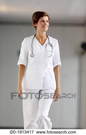 Nurse walking in corridor, Onkologikoa Hospital, Oncology Institute, Case Center for prevention, diagnosis and treatment of cancer, Donostia, San Sebastian, Gipuzkoa, Basque Country, Spain View Large Photo Image Stock Photo - Nurse walking in corridor, Onkologikoa Hospital, Oncology Institute, Case Center for prevention, diagnosis and treatment of cancer, Donostia, San Sebastian, Gipuzkoa, Basque Country, Spain. Fotosearch
