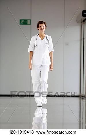 Nurse walking in corridor, Onkologikoa Hospital, Oncology Institute, Case Center for prevention, diagnosis and treatment of cancer, Donostia, San Sebastian, Gipuzkoa, Basque Country, Spain View Large Photo Image Stock Photo - Nurse walking in corridor, Onkologikoa Hospital, Oncology Institute, Case Center for prevention, diagnosis and treatment of cancer, Donostia, San Sebastian, Gipuzkoa, Basque Country, Spain. Fotosearch