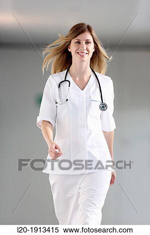 Nurse walking in corridor, Onkologikoa Hospital, Oncology Institute, Case Center for prevention, diagnosis and treatment of cancer, Donostia, San Sebastian, Gipuzkoa, Basque Country, Spain View Large Photo Image Stock Photography - Nurse walking in corridor, Onkologikoa Hospital, Oncology Institute, Case Center for prevention, diagnosis and treatment of cancer, Donostia, San Sebastian, Gipuzkoa, Basque Country, Spain. Fotosearch