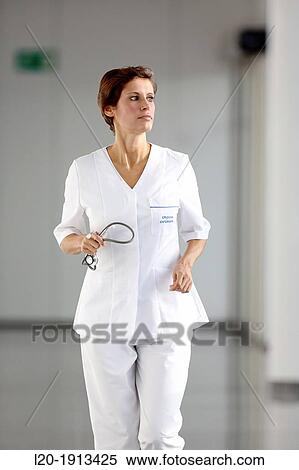 Nurse walking in corridor, Onkologikoa Hospital, Oncology Institute, Case Center for prevention, diagnosis and treatment of cancer, Donostia, San Sebastian, Gipuzkoa, Basque Country, Spain View Large Photo Image Stock Photography - Nurse walking in corridor, Onkologikoa Hospital, Oncology Institute, Case Center for prevention, diagnosis and treatment of cancer, Donostia, San Sebastian, Gipuzkoa, Basque Country, Spain. Fotosearch