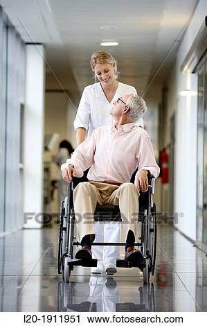 Nurse with patient in wheelchair, Corridor, Onkologikoa Hospital, Oncology Institute, Case Center for prevention, diagnosis and treatment of cancer, Donostia, San Sebastian, Gipuzkoa, Basque Country, Spain View Large Photo Image Stock Image - Nurse with patient in wheelchair, Corridor, Onkologikoa Hospital, Oncology Institute, Case Center for prevention, diagnosis and treatment of cancer, Donostia, San Sebastian, Gipuzkoa, Basque Country, Spain. Fotosearch