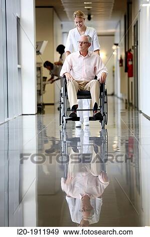 Nurse with patient in wheelchair, Corridor, Onkologikoa Hospital, Oncology Institute, Case Center for prevention, diagnosis and treatment of cancer, Donostia, San Sebastian, Gipuzkoa, Basque Country, Spain View Large Photo Image Stock Photo - Nurse with patient in wheelchair, Corridor, Onkologikoa Hospital, Oncology Institute, Case Center for prevention, diagnosis and treatment of cancer, Donostia, San Sebastian, Gipuzkoa, Basque Country, Spain. Fotosearch