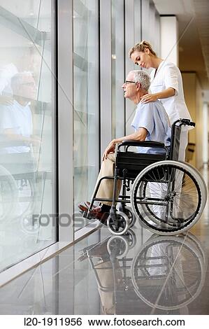 Nurse with patient in wheelchair, Corridor, Onkologikoa Hospital, Oncology Institute, Case Center for prevention, diagnosis and treatment of cancer, Donostia, San Sebastian, Gipuzkoa, Basque Country, Spain View Large Photo Image Stock Photograph - Nurse with patient in wheelchair, Corridor, Onkologikoa Hospital, Oncology Institute, Case Center for prevention, diagnosis and treatment of cancer, Donostia, San Sebastian, Gipuzkoa, Basque Country, Spain. Fotosearch