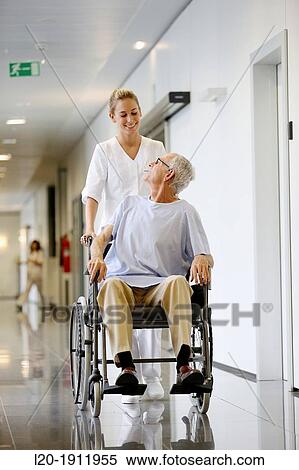 Nurse with patient in wheelchair, Corridor, Onkologikoa Hospital, Oncology Institute, Case Center for prevention, diagnosis and treatment of cancer, Donostia, San Sebastian, Gipuzkoa, Basque Country, Spain View Large Photo Image Stock Photography - Nurse with patient in wheelchair, Corridor, Onkologikoa Hospital, Oncology Institute, Case Center for prevention, diagnosis and treatment of cancer, Donostia, San Sebastian, Gipuzkoa, Basque Country, Spain. Fotosearch