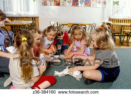 Nursery school. Playing View Large Photo Image Stock Image - Nursery school. Playing. Fotosearch