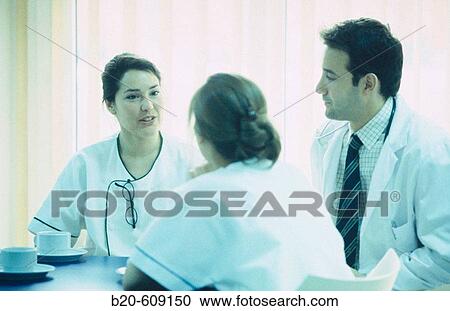 Nurses and doctor at coffee shop of hospital View Large Photo Image Stock Image - Nurses and doctor at coffee shop of hospital. Fotosearch