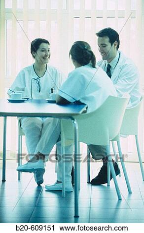 Nurses and doctor at coffee shop of hospital View Large Photo Image Stock Image - Nurses and doctor at coffee shop of hospital. Fotosearch