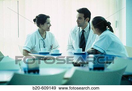 Nurses and doctor at coffee shop of hospital View Large Photo Image Stock Photo - Nurses and doctor at coffee shop of hospital. Fotosearch