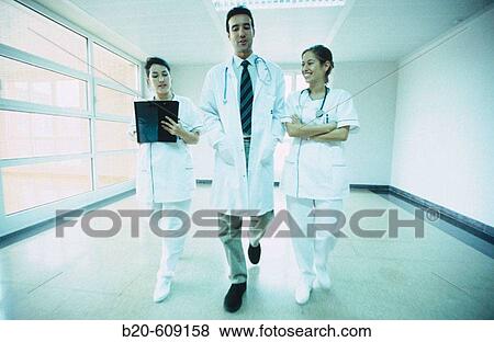 Stock Photo - Nurses and doctor. Fotosearch