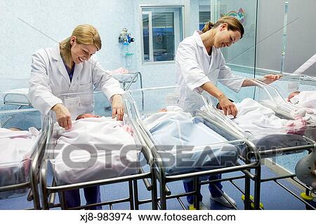 Nurses and newborn babies, child-care unit, pediatrics. Hospital Policlinica Gipuzkoa, San Sebastian, Donostia, Euskadi, Spain View Large Photo Image Picture - Nurses and newborn babies, child-care unit, pediatrics. Hospital Policlinica Gipuzkoa, San Sebastian, Donostia, Euskadi, Spain. Fotosearch
