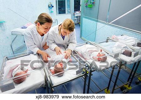 Nurses and newborn babies, child-care unit, pediatrics. Hospital Policlinica Gipuzkoa, San Sebastian, Donostia, Euskadi, Spain View Large Photo Image Stock Photo - Nurses and newborn babies, child-care unit, pediatrics. Hospital Policlinica Gipuzkoa, San Sebastian, Donostia, Euskadi, Spain. Fotosearch