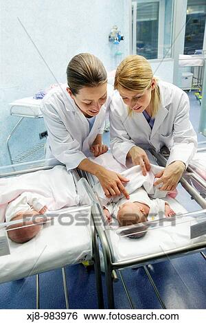 Nurses and newborn babies, child-care unit, pediatrics. Hospital Policlinica Gipuzkoa, San Sebastian, Donostia, Euskadi, Spain View Large Photo Image Stock Photograph - Nurses and newborn babies, child-care unit, pediatrics. Hospital Policlinica Gipuzkoa, San Sebastian, Donostia, Euskadi, Spain. Fotosearch