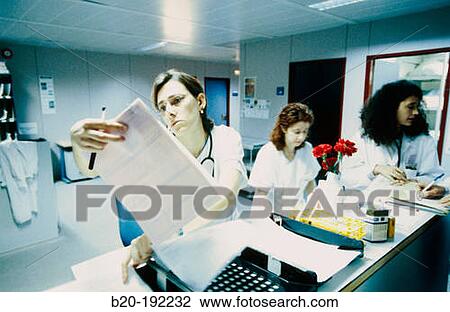 Nurses at admission desk in emergency area View Large Photo Image Stock Image - Nurses at admission desk in emergency area. Fotosearch