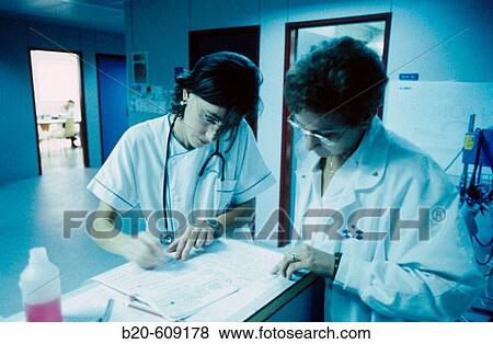 Nurses at admission desk in emergency area View Large Photo Image Stock Photo - Nurses at admission desk in emergency area. Fotosearch