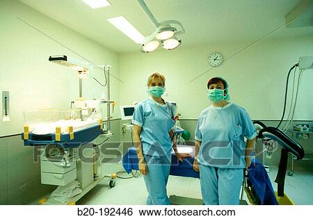 Nurses at hospital delivery room View Large Photo Image Stock Photograph - Nurses at hospital delivery room. Fotosearch