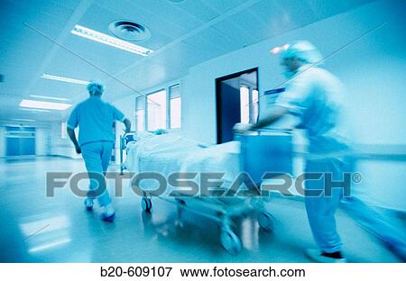 Nurses carrying stretcher View Large Photo Image Stock Photo - Nurses carrying stretcher. Fotosearch