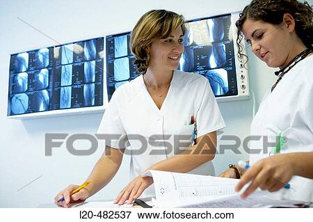 Stock Photo - Nurses changing shift, Neurosurgery department. Hospital Universitario Gran Canaria Doctor Negrin, Las Palmas de Gran Canaria. Canary Islands, Spain. Fotosearch