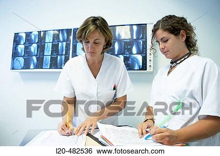 Nurses changing shift, Neurosurgery department. Hospital Universitario Gran Canaria Doctor Negrin, Las Palmas de Gran Canaria. Canary Islands, Spain View Large Photo Image Stock Photograph - Nurses changing shift, Neurosurgery department. Hospital Universitario Gran Canaria Doctor Negrin, Las Palmas de Gran Canaria. Canary Islands, Spain. Fotosearch