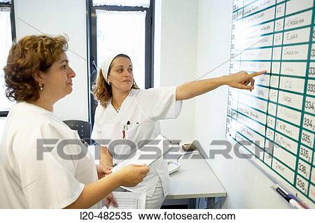 Nurses changing shift, Neurosurgery department. Hospital Universitario Gran Canaria Doctor Negrin, Las Palmas de Gran Canaria. Canary Islands, Spain View Large Photo Image Stock Photography - Nurses changing shift, Neurosurgery department. Hospital Universitario Gran Canaria Doctor Negrin, Las Palmas de Gran Canaria. Canary Islands, Spain. Fotosearch