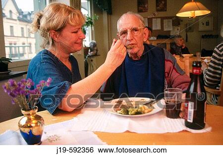 Nursing home, eldercare. Assistant nurse. View Large Photo Image Stock Photograph - Nursing home, eldercare. Assistant nurse.. Fotosearch