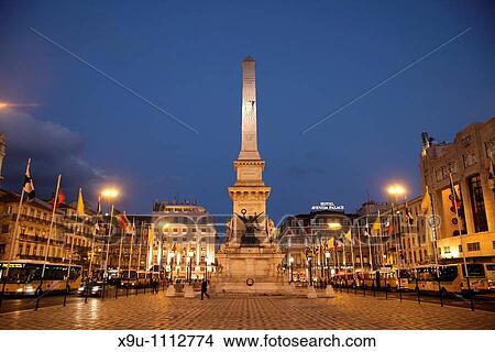 Obelisk on the square Praca dos Restauradores in Lisbon at night, Portugal, Europe View Large Photo Image Picture - Obelisk on the square Praca dos Restauradores in Lisbon at night, Portugal, Europe. Fotosearch