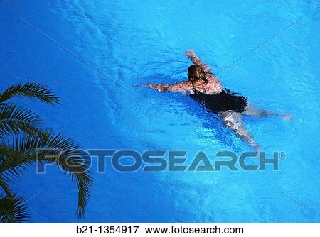Obese woman swimming View Large Photo Image Stock Photo - Obese woman swimming. Fotosearch