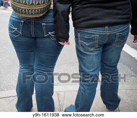 Obese women walk in Midtown Manhattan in New York New York has seen a drop in childhood obesity rates, validating the public health policies developed by the city, according to NYC Health Commissioner Thomas Farley View Large Photo Image Stock Photo - Obese women walk in Midtown Manhattan in New York New York has seen a drop in childhood obesity rates, validating the public health policies developed by the city, according to NYC Health Commissioner Thomas Farley. Fotosearch