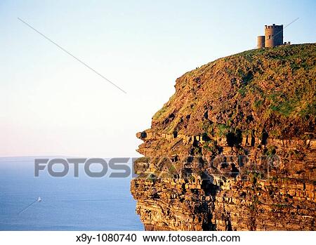 OBriens Tower on top of the sheer Cliffs of Moher, County Clare, west Ireland Sailboat yacht in distance Atlantic Ocean View Large Photo Image Stock Image - OBriens Tower on top of the sheer Cliffs of Moher, County Clare, west Ireland Sailboat yacht in distance Atlantic Ocean. Fotosearch