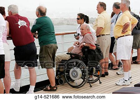 Observation Deck, wheelchair, disabled, passengers. MS Noordam. Holland America Line. San Juan Bay. Puerto Rico. View Large Photo Image Stock Photograph - Observation Deck, wheelchair, disabled, passengers. MS Noordam. Holland America Line. San Juan Bay. Puerto Rico.. Fotosearch