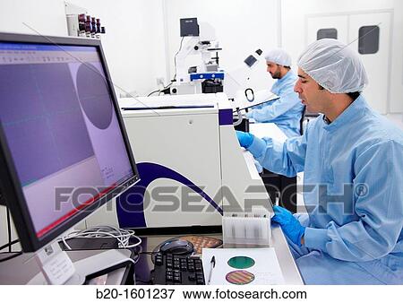 Stock Photo - Observation of silicon wafer Tencor profilometer. Fotosearch